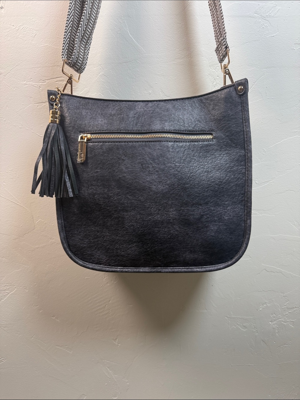 HKCLUF Charcoal Crossbody purse with Tassel Accent NWOT